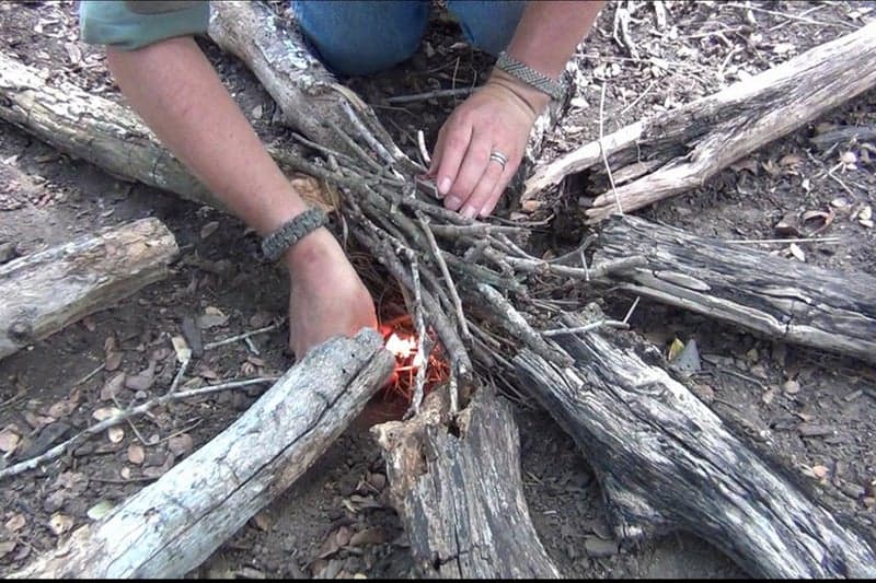 how to make a fire in the wilderness with nothing